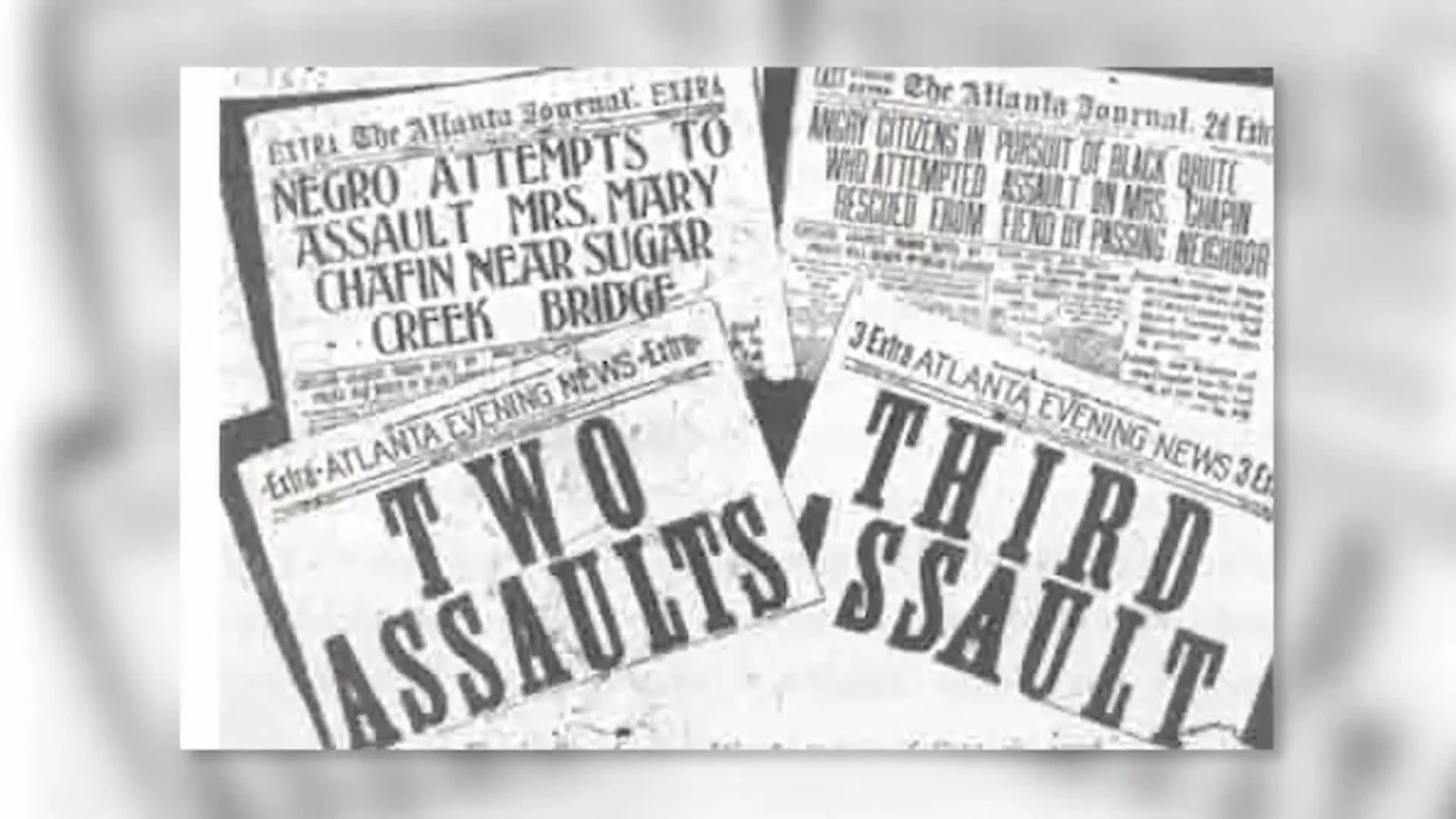 Front pages of the Atlanta Journal and Atlanta Evening News special editions of September 22, 1906, headlined TWO ASSAULTS and THIRD ASSAULT.